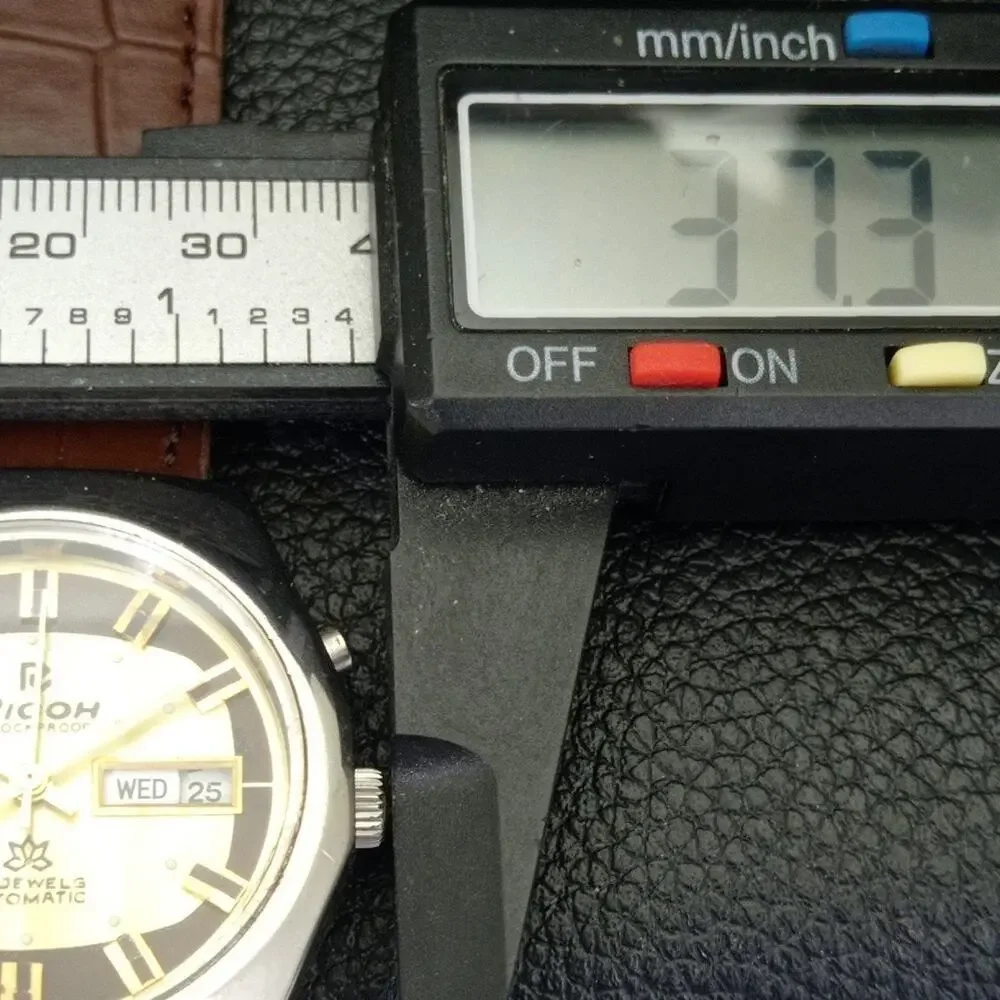 Vintage 1985 Ricoh Automatic Mens Silver Watch W/daydate & Gold accents